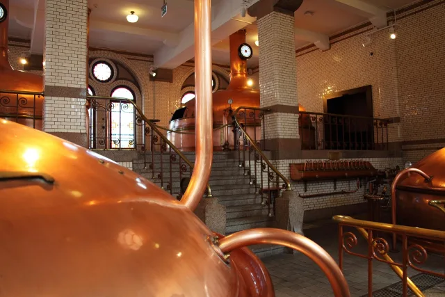 Industrial copper pipes and metal manufacturing materials in a modern facility